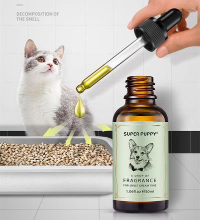 Cat and fragrance dropper over litter box, showcasing Super Puppy scent for a fresh home environment.