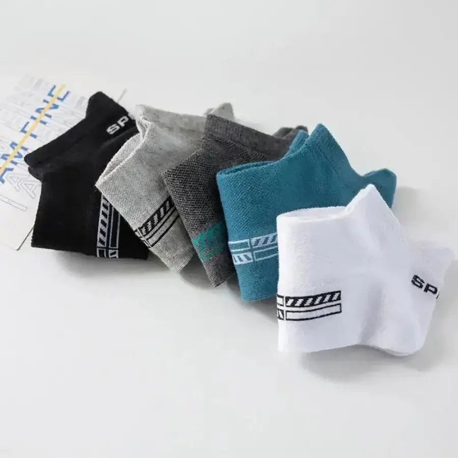Set of five pairs of trendy low-cut socks in various colors for men, showcasing high-quality and comfortable fabric.