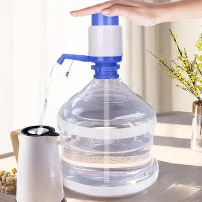 Manual hand pump for water bottles, dispensing fresh water effortlessly from a large bottle.