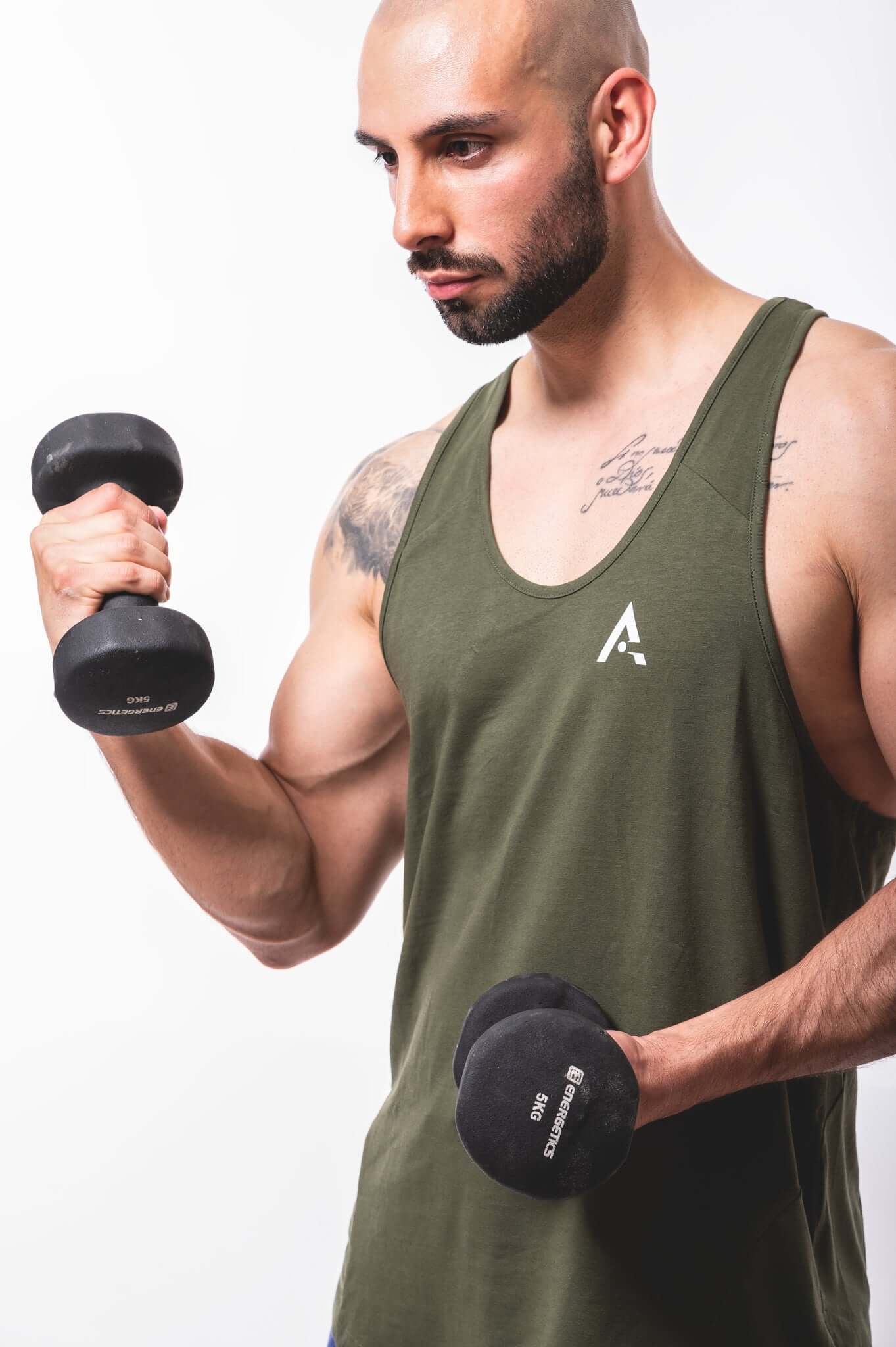 Mens fitness stringer tank top, perfect for workouts, showcasing muscle definition and offering comfort.