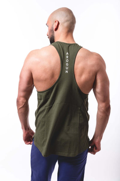 Men's fitness stringer tank top in olive green, showcasing muscular build, perfect for workouts and summer wear.